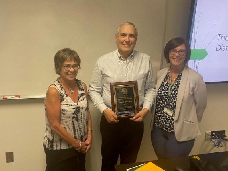 Dr. Paul Insel is flanked by Brody award coordinator Dr. Susan Barman (left) and department Chairperson Dr. Anne Dorrance.